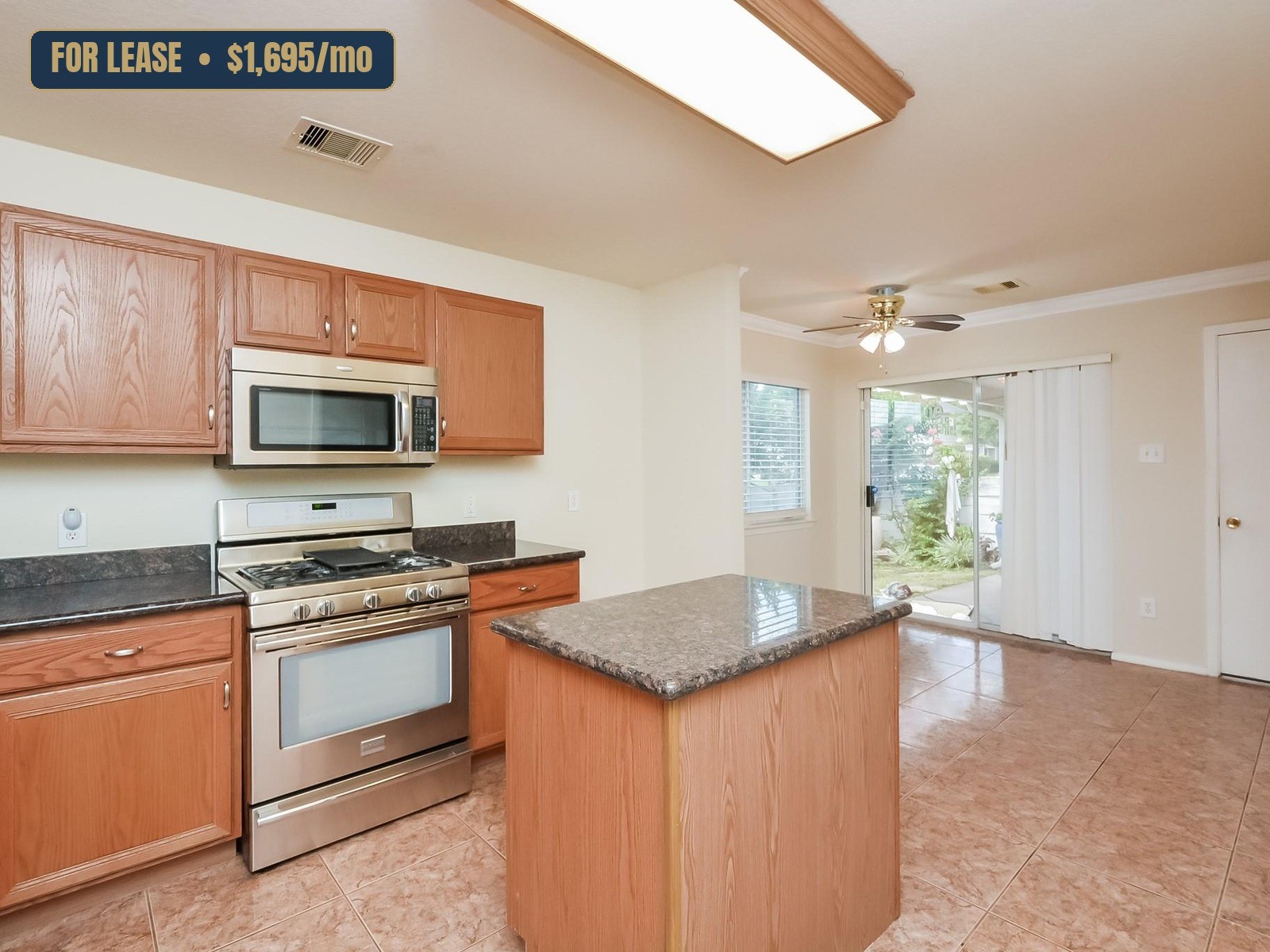 Kitchen with granite counters and stainless appliances, 20934 Patriot Park Ln